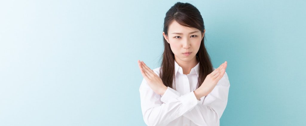 否定する女性のイメージ